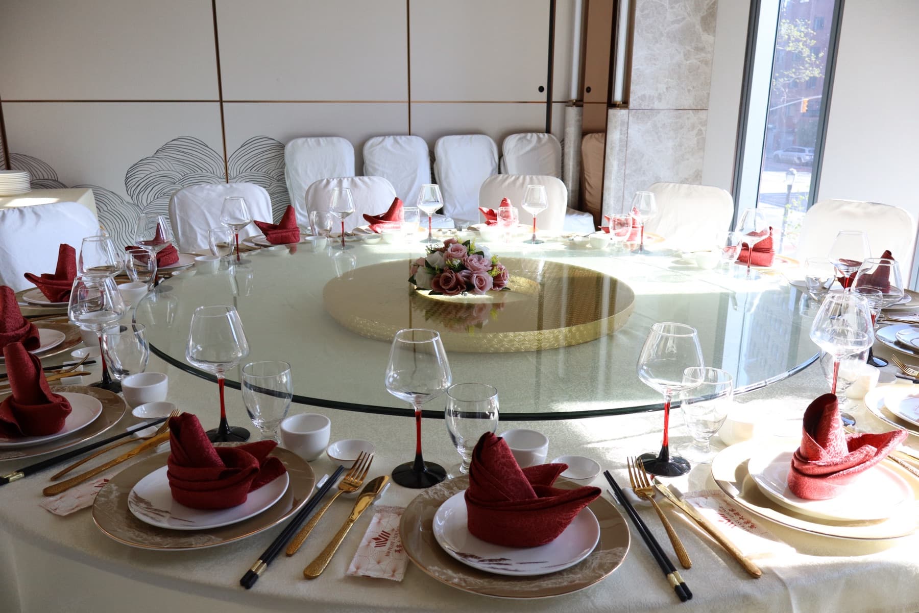 Round banquet table set with gold accents