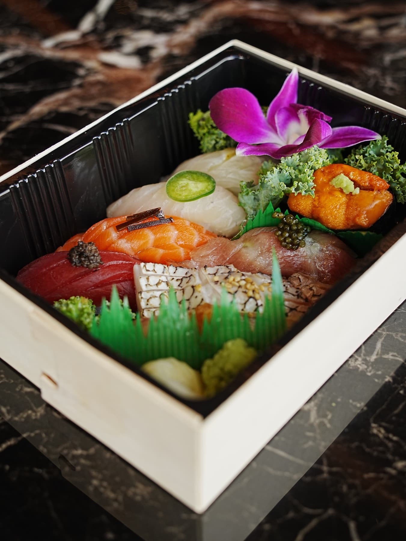 Premium nigiri selection with uni and caviar