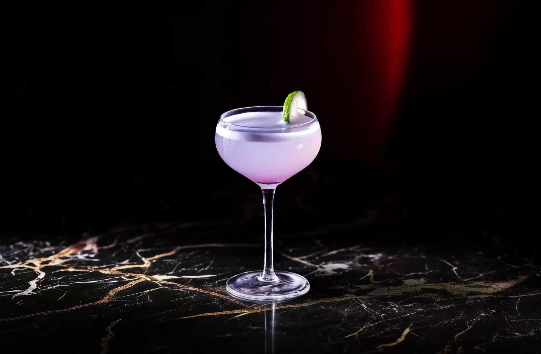 Lavender cocktail served in a coupe