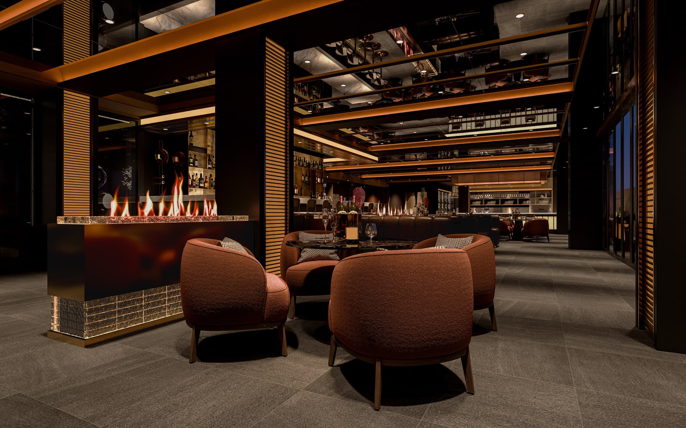 Club chairs around the lounge fireplace