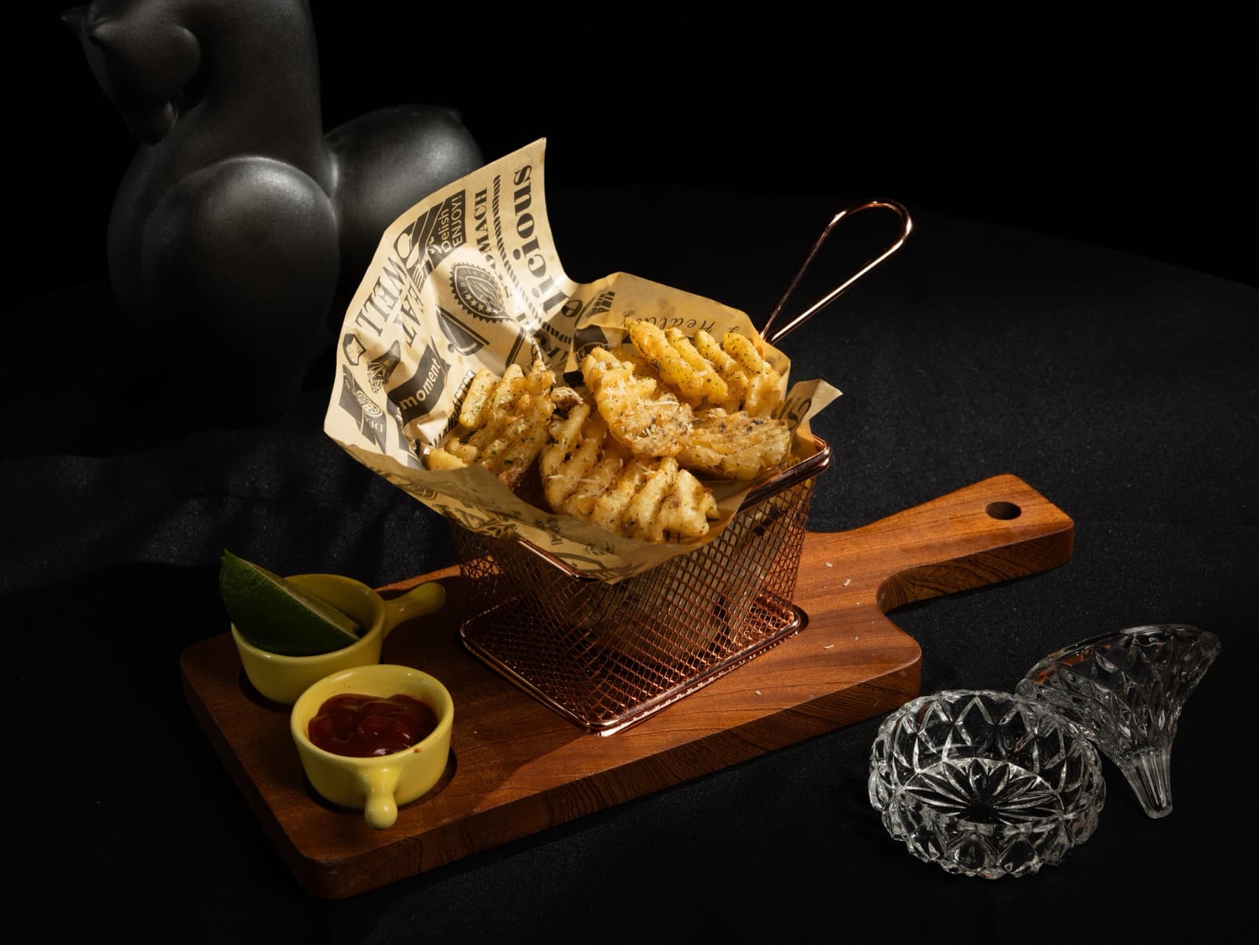Truffle fries served in a copper basket
